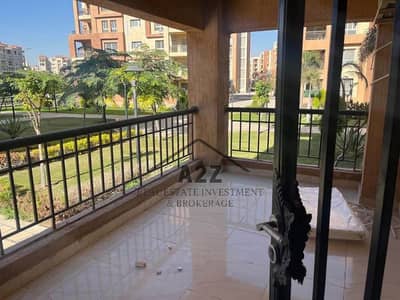 For sale in Madinaty, the apartment 8 with furnishings and devices, offering a distinctive monthly return overlooking a garden, all dues cleared