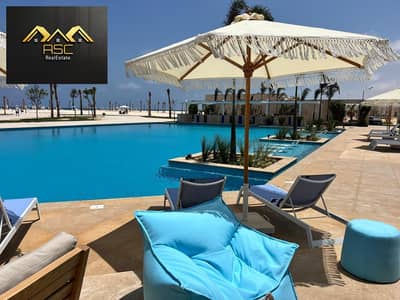 اقل سعر شاليه فى سى شور هايد بارك راس الحكمه بالساحل الشمالى - برايم لوكيشن على حمام سباحه مباشر - الدور الثالث - تشطيب سوبر لوكس