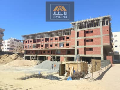 77 sqm apartment for sale on Main Hijaz Street with pool view, Green Contract, installments up to 42 months, and 20% cash discount.