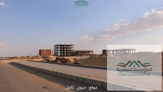 أرض لقطة 450م دبل فيس بالرخصة في الحي الثاني أكتوبر الجديدة