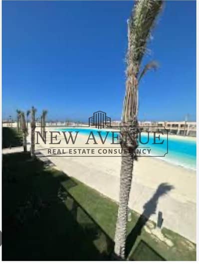 شاليه بحديقة مكتمل التشطيب بحرى على اللاجون للبيع في بلايا غزالة الساحل الشمالي Playa Ghazala من تطوير جي ديفيلوبمنتس