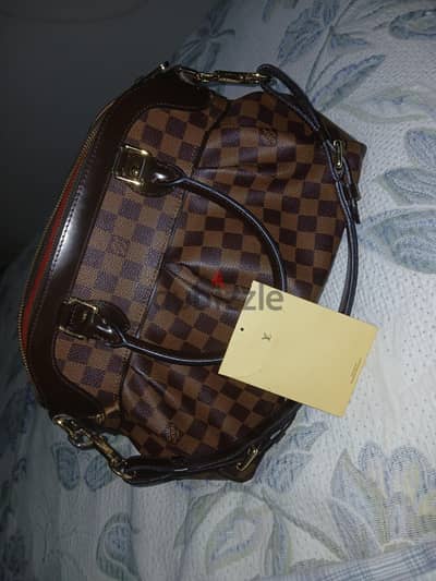شنطه louis vuitton