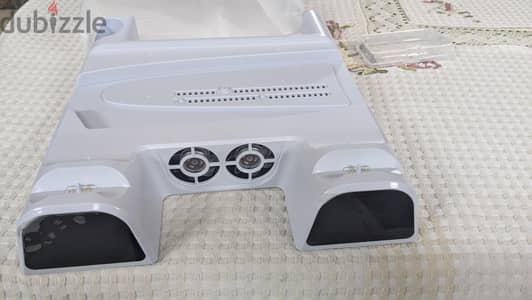 PS5 stand with charger and cooler