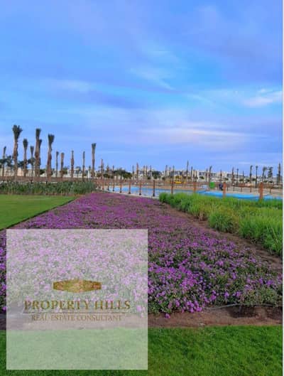 Two-bedroom apartment with an open view, priced below market value, excellent layout, and 125 square meters in Hyde Park, New Cairo.