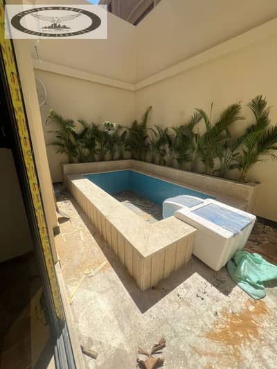 Studio apartment for sale with a swimming pool in New Cairo, Prime Location, on Mustafa Kamel Axis, Public Security Villas.  Near all services, malls,