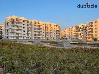 With a 10% down payment and installments over 12 years, a ground floor apartment with a private garden for sale in Mazarin North Coast Compo