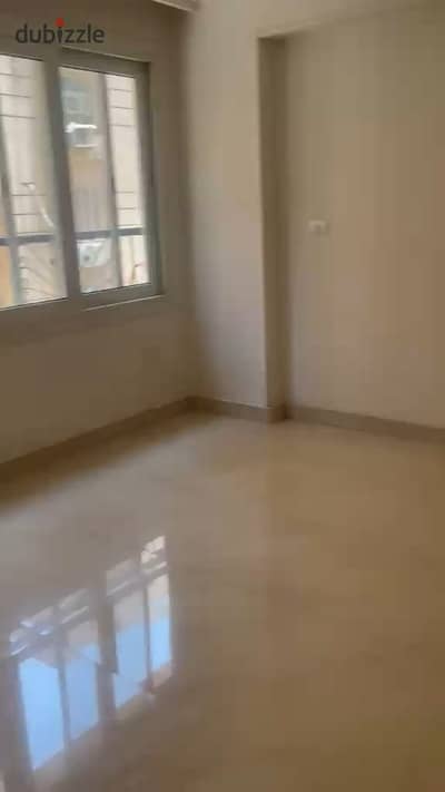 For rent, a residential apartment of 200 m² in a distinguished location in Police Division - on Taha Hussein branches and near the Computer Institute - Al-Nuzha Al-Jadida