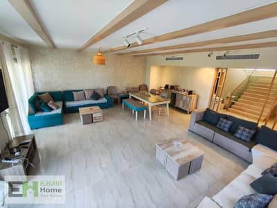 Corner villa with big garden for sale in Almaza Bay