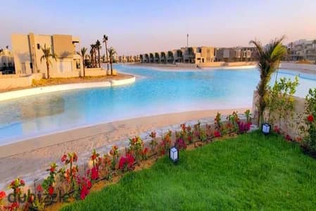 شالية للبيع بڤيو عالبحر تحفة  ارضي بجاردن في ازها الساحل الشمالي بالقرب من ماونتن ڤيو رأس الحكمه و لاڤيستا