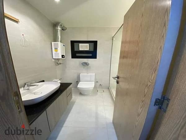 For quick sale, a ground floor chalet with a private garden divided into 3bedrooms in Ain Sokhna, La Vista Ray Village