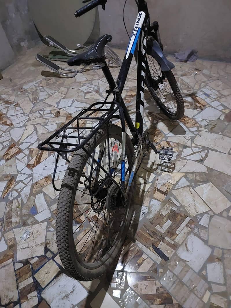 Trinx m126 elite 1