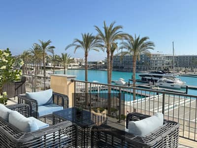 For sale at a special price Chalet in Marina Views Marassi overlooking the canal Features 3 bedrooms 3 bathrooms fully finished with kitchen and air c