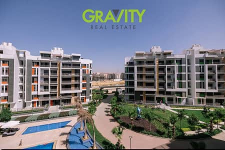 Receive a ready-to-move-in 3-bedroom apartment with an open view in Fifth Settlement - Apartment for sale - The Icon - New Cairo - Cash price