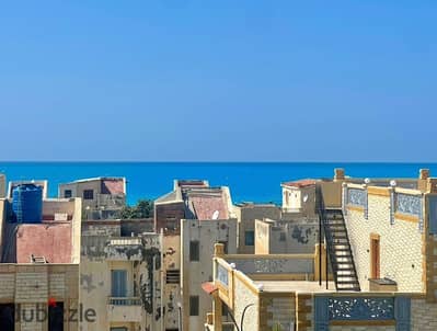 فرصة للايجار قرية بدر الساحل الشمالي رووف غرفتين وريسبشن يري البحر تشطيب فندقي مكيف