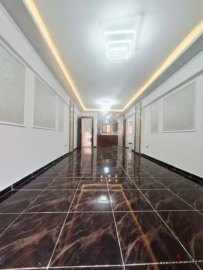 Luxury apartment 130m for sale in Al-Ajami Beach of Nakheel near the sea finishing ultra-luxurious