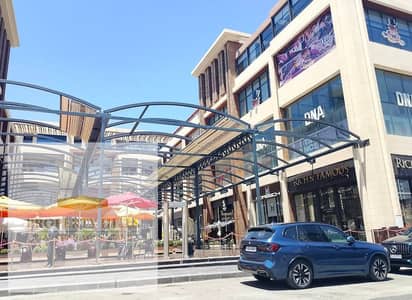 A shop for immediate occupancy, currently rented with a high monthly return of 300,000 in the Golden Square area of ​​Fifth Settlement. Installment plans are available for the price over an extended period.