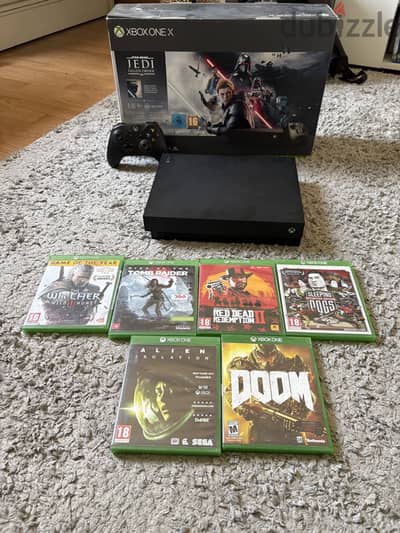 Xbox One X + 10 Games for sale / إكسبوكس وان إكس و معاه ١٠ ألعاب