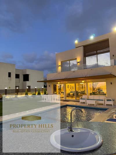 STANDALONE VILLA FOR SALE AT AZHA NORTH COAST FINISHED + AC'S + KITCHEN SEA VIEW* FIRST ROW LAGOON* LOWEST DOWN PAYMENT +INSTALLMENTS UP TO 10 YEARS *