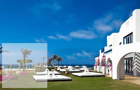 بسعر الطرح الاول بيتش هاوس متشطب بالكامل في ماوتن فيو - الساحل الشمالي  بدبل فيو البحر و اللاجون و بالاقساط علي 10 سنين في كريستا