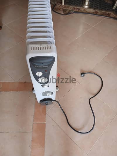 مدفأة زيت من بلاك اند ديكر - 13 زعنفة - 2500 وات - أبيض- or013fd