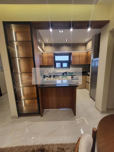 Fully furnished apartment for rent in Madinaty B15.133 sqm, 3 bedrooms, 2 bathrooms, super deluxe finish, hotel-style furniture, fully air-conditione