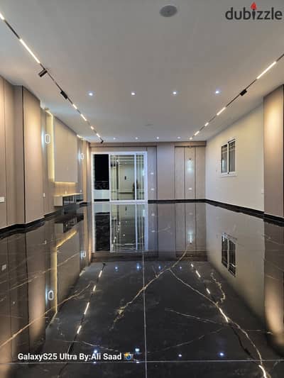 A masterpiece apartment for sale in Al-Haram Gardens, 210 meters facade area, steps away from the mall and club, the new second gate, Ahmos