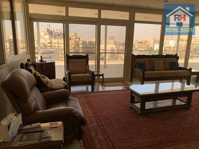 Duplex for sale with private roof – Al-Merghani Main Street , Heliopolis , Egypt . Prime location close to all services .