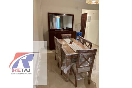 Furnished apartment for rent in Gardenia City Compound, Suez Road – within a vibrant and safe compound suitable for families.