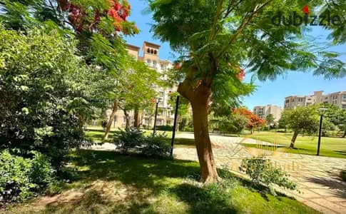 157 sq m ground floor apartment with a 60 sq m garden for sale in Madinaty B1, steps away from services, Metro Market, and the medical center, and min