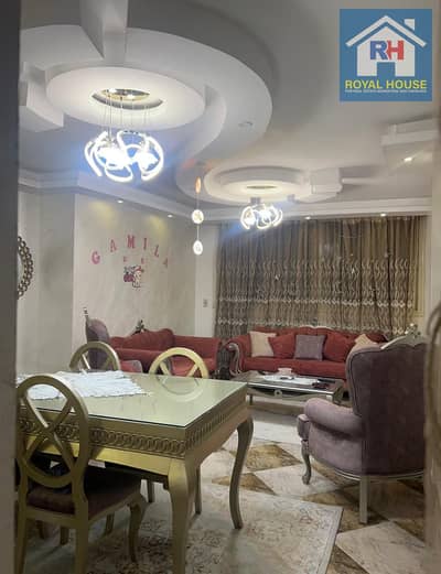90 sq m apartment for sale on Khattab Street, off Manshiet El Tahrir, near the Faculty of Engineering and Marjan Fish Market.
