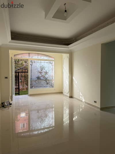 Apartment for sale on the ground floor with a garden in the Rawdat Zayed compound, ultra-luxurious finishing