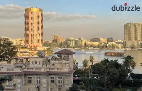 شقة للبيع فى شارع ابن الإخشيد بالدقى  تشطيب سوبر لوكس بفيو مميز  على النيل