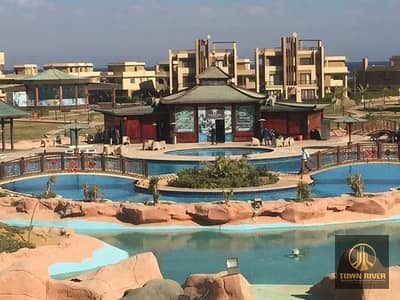 بأفضل فيو فالقريه شاليه ثاني بروف للبيع بأكثر قري استثماريه في العين السخنه قرية بلو باي اسيا بها جميع الخدمات حمامات سباحه , كافيهات