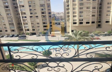 Apartment for sale in Tabarak Compound on Maadi Ring Road, with a pool view.