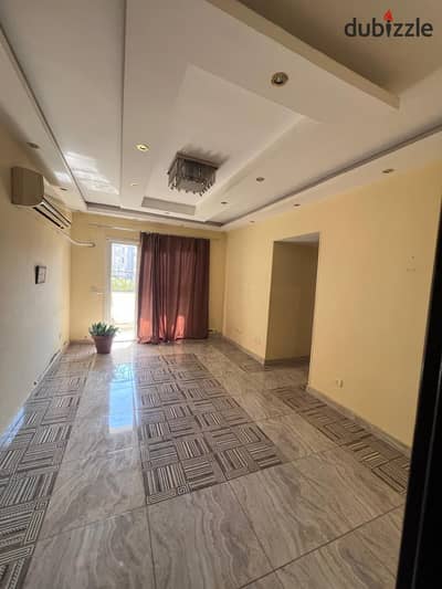 Apartment for Rent in Rawdat Zayed – Kitchen, AC & Bed Included