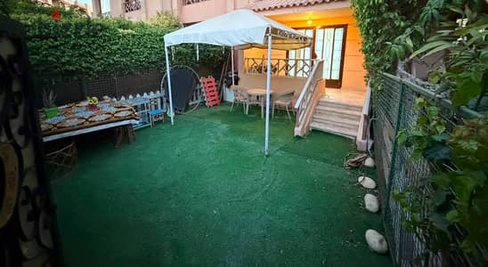 Opportunity for sale in Al-Rehab City, 131 square meters, ground floor with a private garden, garden view of the group.