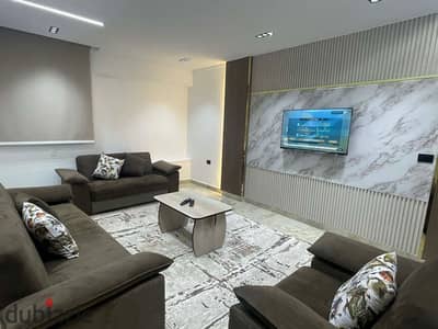 للايجار اول سكن شقة فندقي قرب فندق سفير ميدان المساحه للسكن الراقي والمميز بالدقي