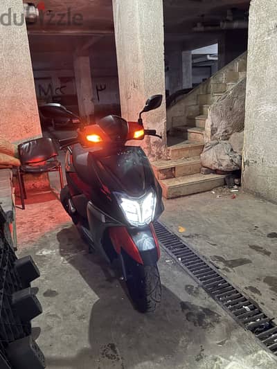 ومعه خوذه LS2 tvs ntorq 125 سكوتر تي في اس