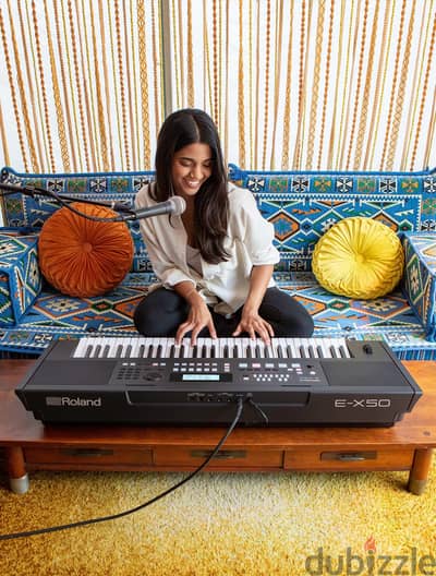 اورج رولاند Roland E-X50 جديد بالكرتونه شرقي غربي