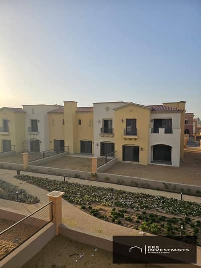 Middle townhouse for sale with the lowest down payment and lowest installments in (Evan) City Gate Qatari Diar - with a distinctive view