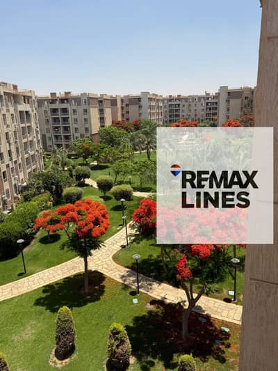Apartment for sale in Madinaty B7 with a down payment of 70 square meters, fourth floor, corner with a wide open garden view, first residence, ultra super lux finishes, steps away from all services, 2 bedrooms and a bathroom at an unbeatable price