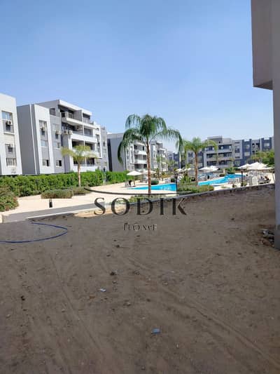 Apartment at a bargain price in High City Compound, prime location, ground floor with garden, maintenance deposit paid, garage unit and 3 meters