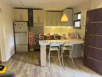 Furnished ground floor studio with private garden for rent in Al Rehab – luxury and comfort, ready to move in immediately 