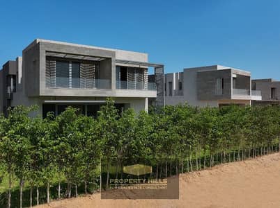 Immediate view town house for sale in Al-Ahramat in Al-Hadba compound near the museum next to Palm Spring
