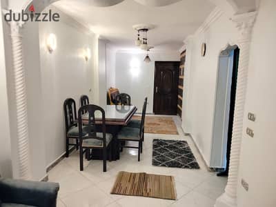 Furnished apartment for rent in Arab Al-Maadi, distinguished location near Maadi Public Library, Olympic Club, and Nasr Street. It consists of two bedrooms, a reception area, a bathroom, and a kitchen. There is air conditioning in the bedroom, wired internet, Wi-Fi, and natural gas. Eighth floor with elevator.