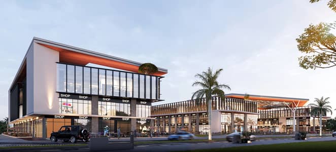 محل تجاري للبيع 38م بالاضافه لمساحه خارجيه 18م دور ارضي شادو بيزنس بارك Shadow Business Park بجوار فاميلي مول وويست جيت وفال بلازا ومحور بلازا