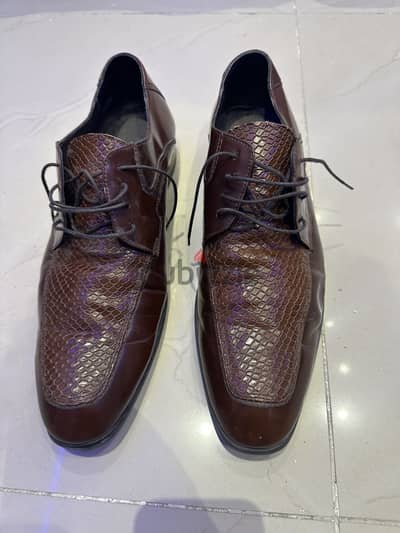 Size 45 dress shoes brown color shipped straight from the UAE