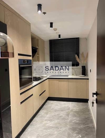 Apartment with garden for sale, finished, with a 30% cash discount, ready for viewing in Scenario Compound, a ready-to-move-in compound in one of the