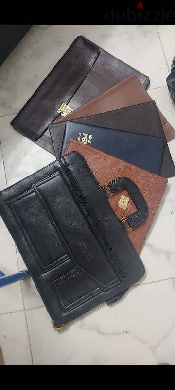 حافظة و شنطة مستندات وأوراق مكتبية