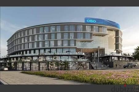 للبيع محلين دبل فيس دور ارضي واجهه في OBO Mall  العبور امام جامعه بنها